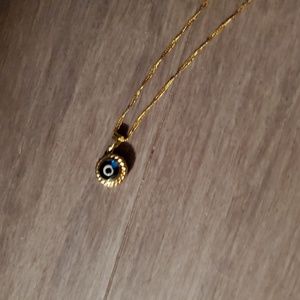Egyptian evil eye necklace on 18" 14kt gold chain
